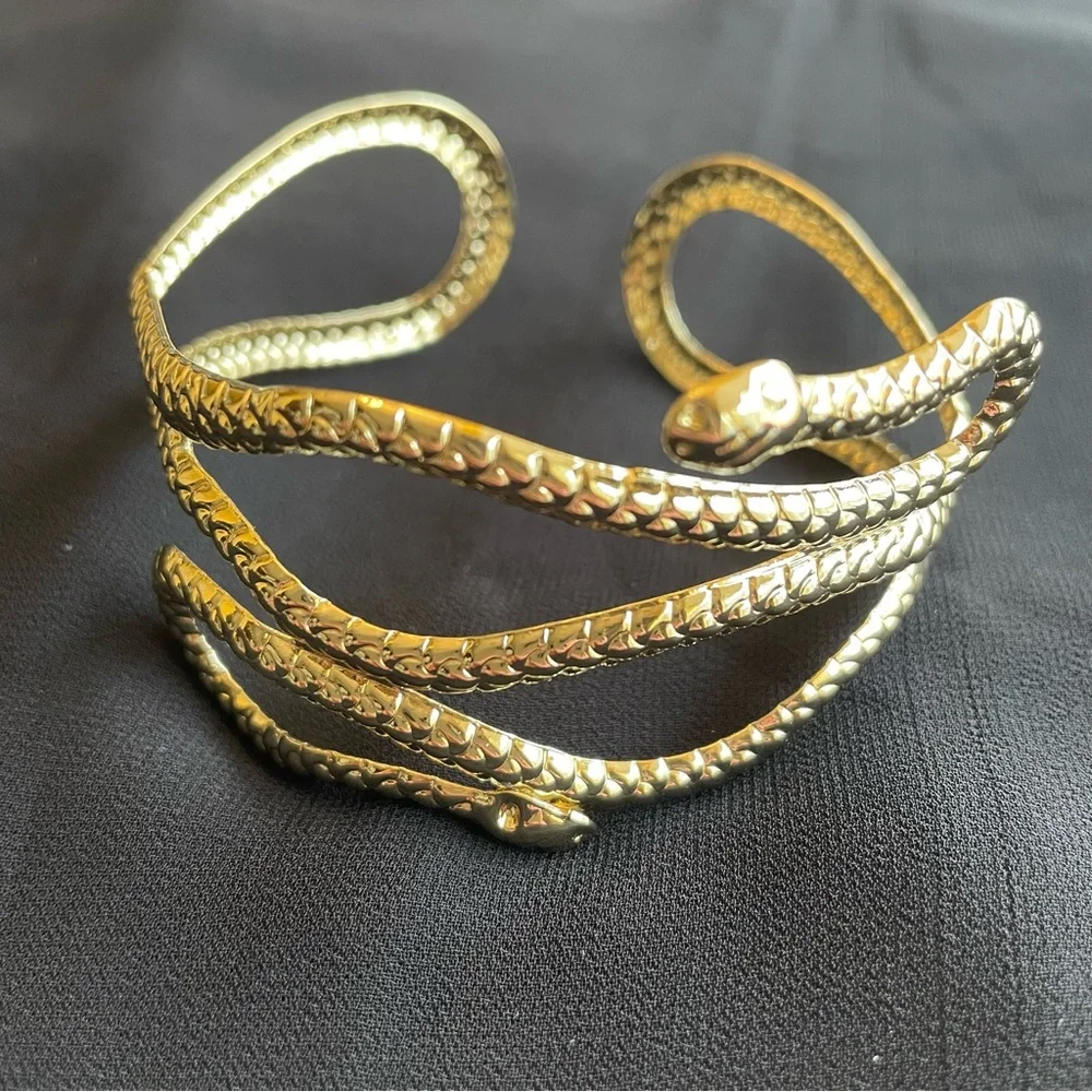 Gold tone metal snake arm cuff